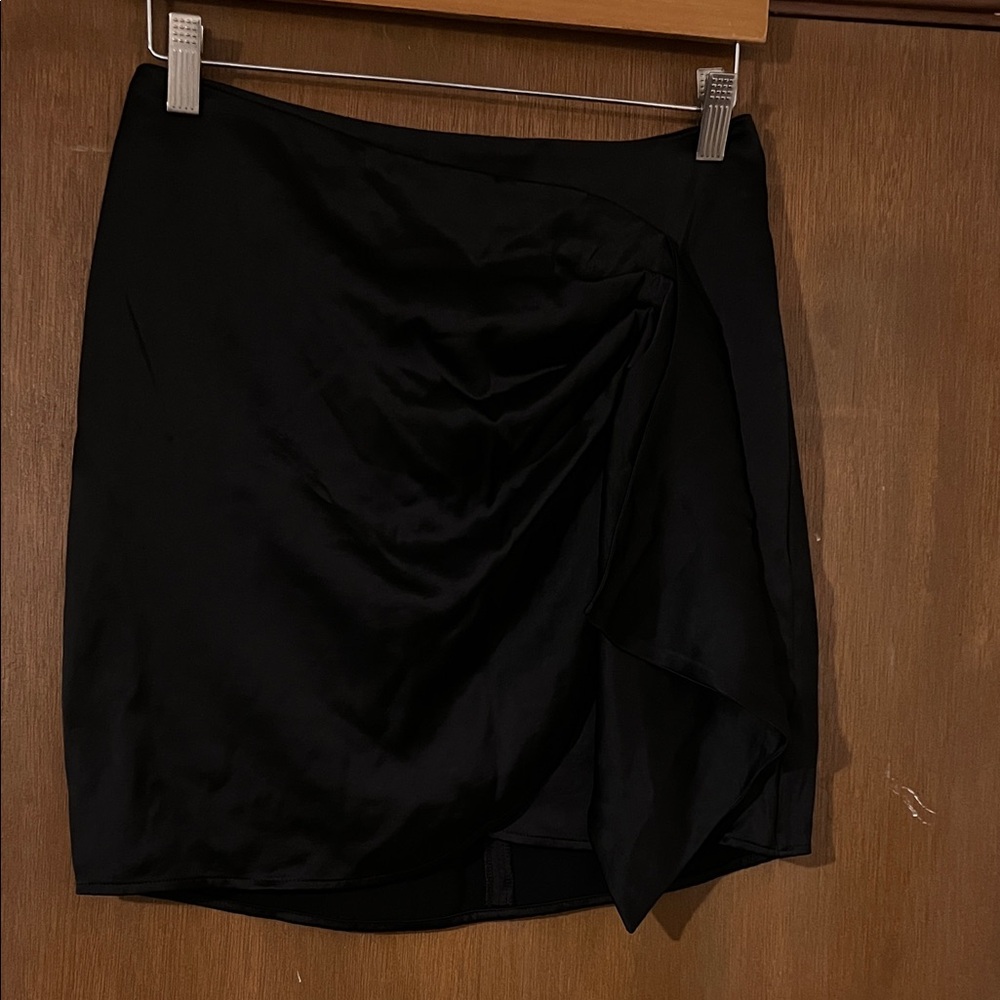 Express Black Mini Skirt new without tags. Beautiful satin skirt!